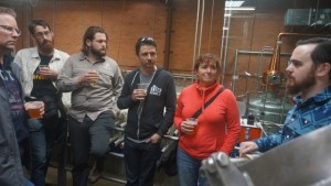 Canberra Brewers get the low-down on the Young Henrys brewing operations from assistant brewer Owen Lyons, far right.
